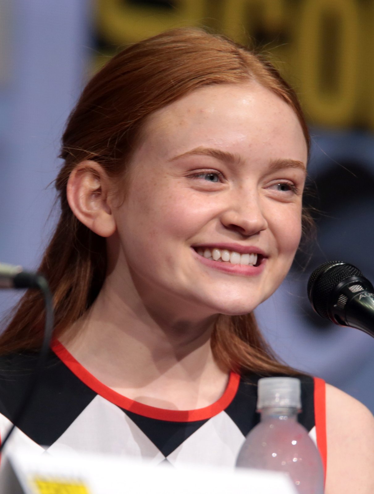 Close portrait of Sadie Sink with red hair at Comic-Con