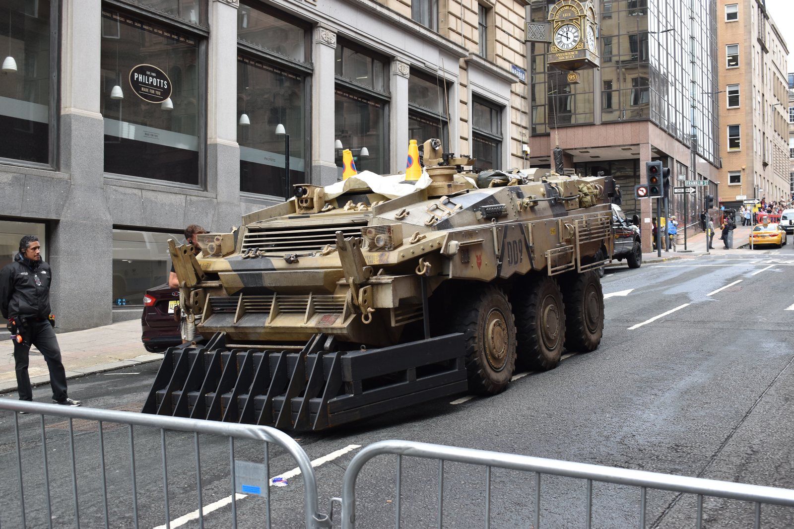 Armored film unit vehicle on a Brand New Day city street set